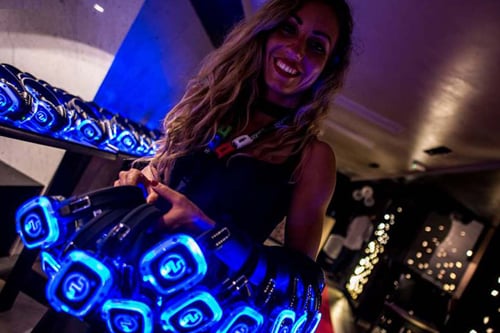 Silent disco party with light-up headphones
